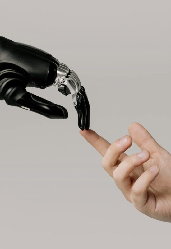 bionic hand and human hand finger pointing