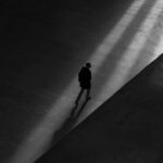 man walking on floor